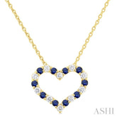 1.4 MM Round Cut Sapphire and 1/8 Ctw Open Heart Round Cut Diamond Precious Fashion Pendant With Chain in 14K Yellow Gold