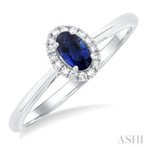 5x3 MM Oval Shape Sapphire and 1/20 Ctw Round Cut Diamond Halo Precious Ring in 14K White Gold