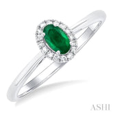 5x3 MM Oval Shape Emerald and 1/20 Ctw Round Cut Diamond Halo Precious Ring in 10K White Gold