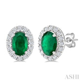 6x4 MM Oval Shape Emerald and 1/4 Ctw Round Cut Diamond Halo Precious Stud Earrings in 14K White Gold