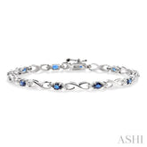 4x3 MM Oval Cut Sapphire and 1/10 Ctw Round Cut Diamond Bracelet in 14K White Gold