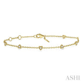 1/6 Ctw Heart Shape Mount Round Cut Diamond Station Bracelet in 10K Yellow Gold