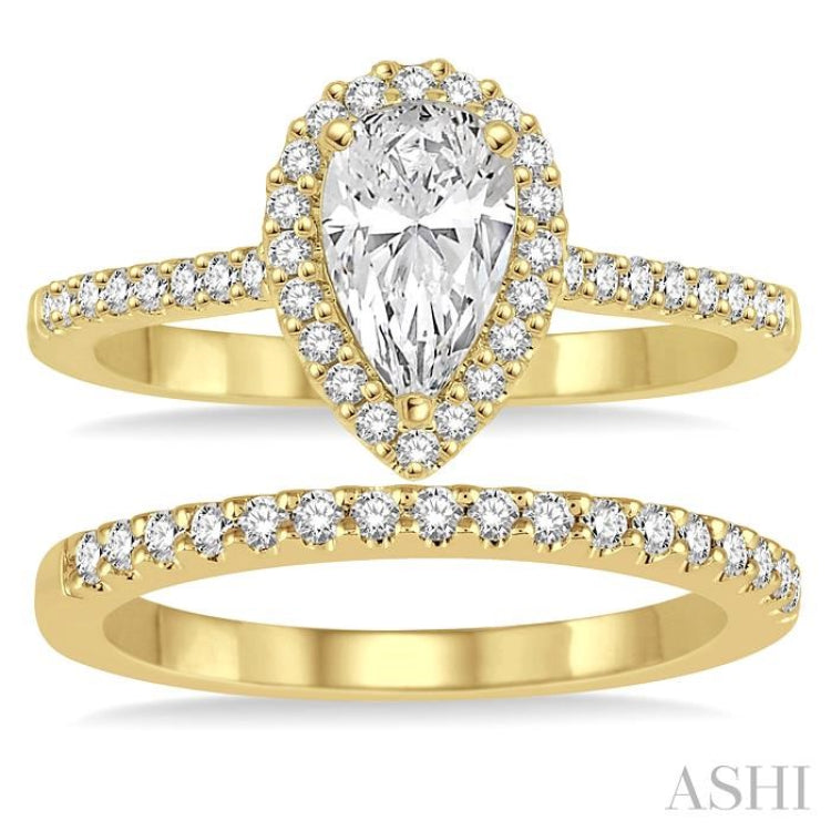 3/4 ctw Diamond Bridal Set with 5/8 ctw Pear Cut Engagement Ring and 1/6 ctw Wedding Band in 14K Yellow Gold