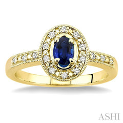 5x3 MM oval cut Sapphire and 1/10 Ctw Single Cut Diamond Ring in 10K Yellow Gold.