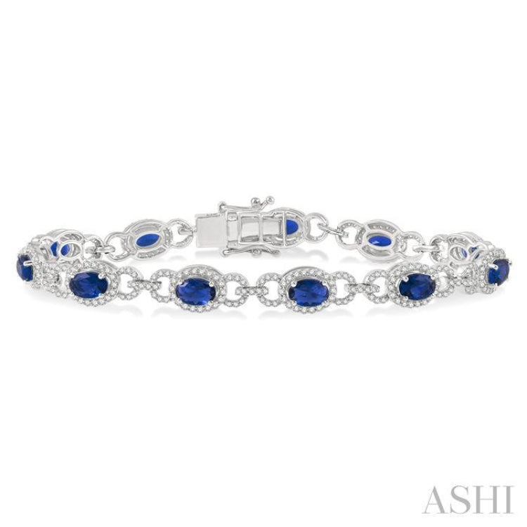 6x4 MM Oval Cut Sapphire and 1 3/4 Ctw Round Cut Diamond Precious Bracelet in 14K White Gold