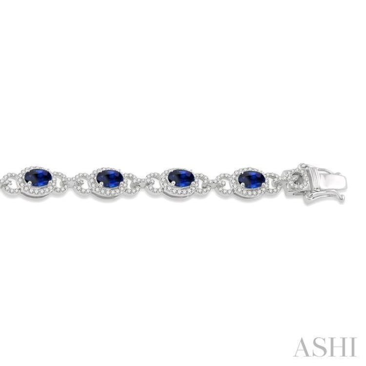 6x4 MM Oval Cut Sapphire and 1 3/4 Ctw Round Cut Diamond Precious Bracelet in 14K White Gold