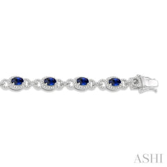 6x4 MM Oval Cut Sapphire and 1 3/4 Ctw Round Cut Diamond Precious Bracelet in 14K White Gold