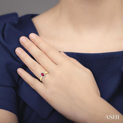 6x4MM Oval Cut Ruby and 1/5 Ctw Round Cut Diamond Ring in 14K Yellow Gold
