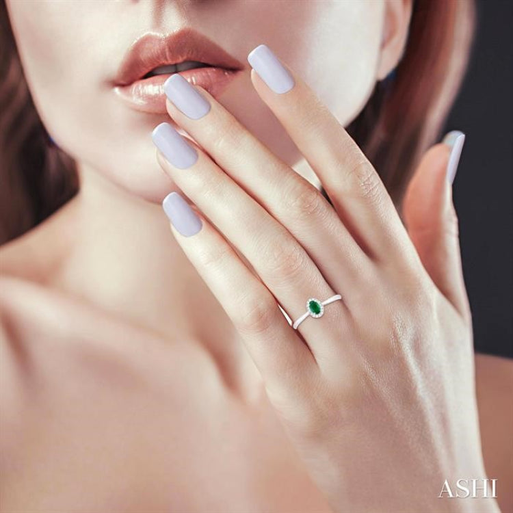 5x3 MM Oval Shape Emerald and 1/20 Ctw Round Cut Diamond Halo Precious Ring in 10K White Gold