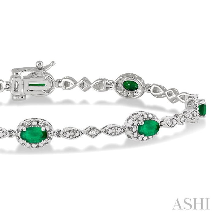 5x3 MM Oval Cut Emerald and 1/20 Ctw Round Cut Diamond Bracelet in 10K White Gold