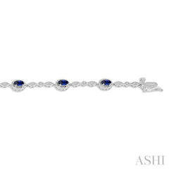 5x3 MM Oval Cut Sapphire and 1/20 Ctw Round Cut Diamond Bracelet in 10K White Gold