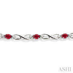 4x3 MM Oval Cut Ruby and 1/10 Ctw Round Cut Diamond Bracelet in 10K White Gold