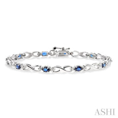 4x3 MM Oval Cut Sapphire and 1/10 Ctw Round Cut Diamond Bracelet in 10K White Gold