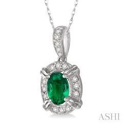 6x4 MM Oval Cut Emerald and 1/10 Ctw Single Cut Diamond Pendant in 14K White Gold with Chain