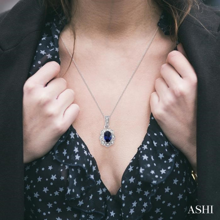 6x4 MM Oval Cut Sapphire and 1/20 Ctw Round Cut Diamond Pendant in Sterling Silver with Chain