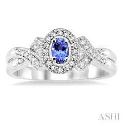 5x3 MM Oval Cut Tanzanite and 1/50 Ctw Single Cut Diamond Ring in Sterling Silver