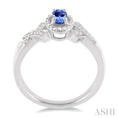 5x3 MM Oval Cut Tanzanite and 1/50 Ctw Single Cut Diamond Ring in Sterling Silver