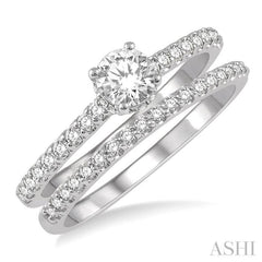 3/4 Ctw Diamond Wedding Set With 5/8 Ct Round Cut Diamond Engagement Ring and 1/6 Ct Wedding Band in 14K White Gold