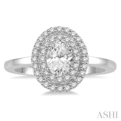 1/2 ctw Oval Cut Center Stone and Round Cut Diamond 1/3 ctw Ladies Engagement Ring in 14K White Gold