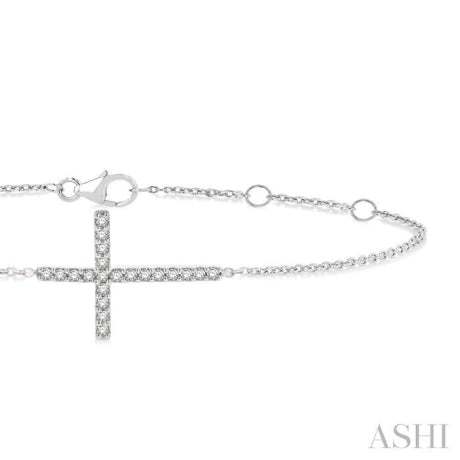 1/8 ctw Petite Reclined Cross Round Cut Diamond Fashion Bracelet in 10K White Gold